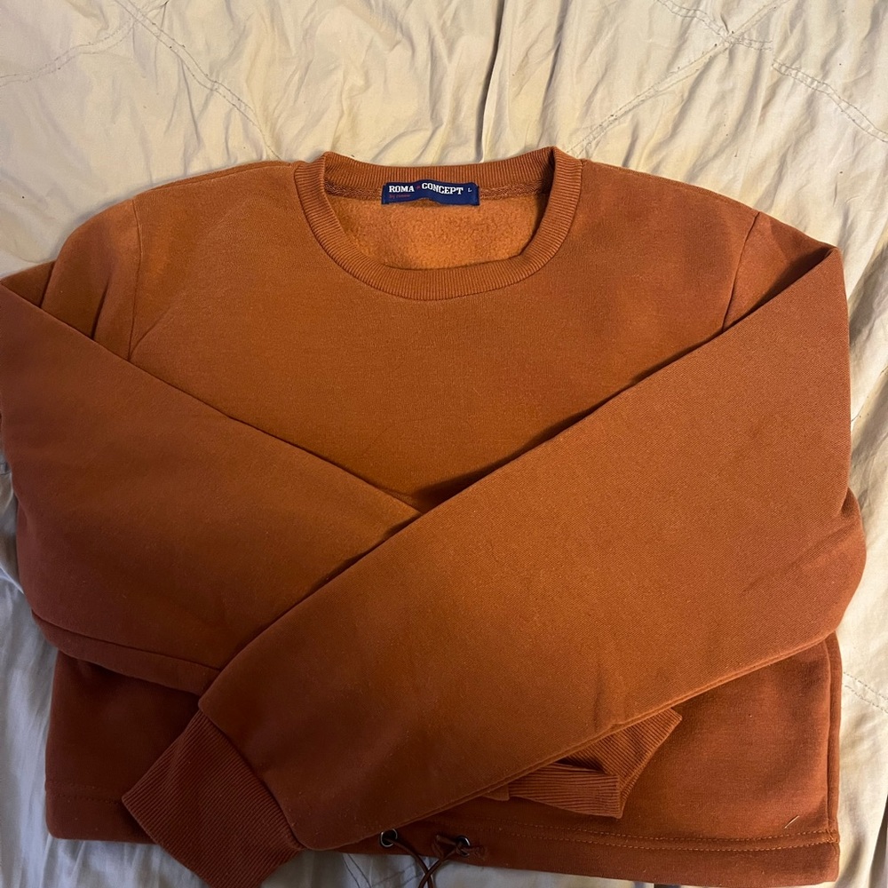 Roma Concept by rosee brown crew neck in size large with elastic tie at bottom